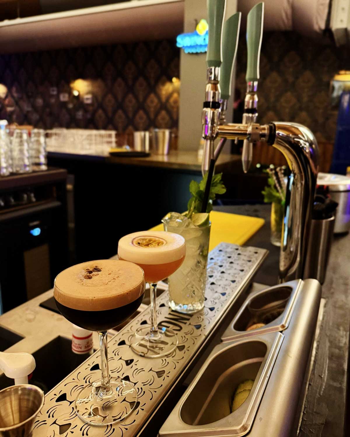 Springbay cocktail tap behind the bar at Mooie Boules with fresh garnishes
